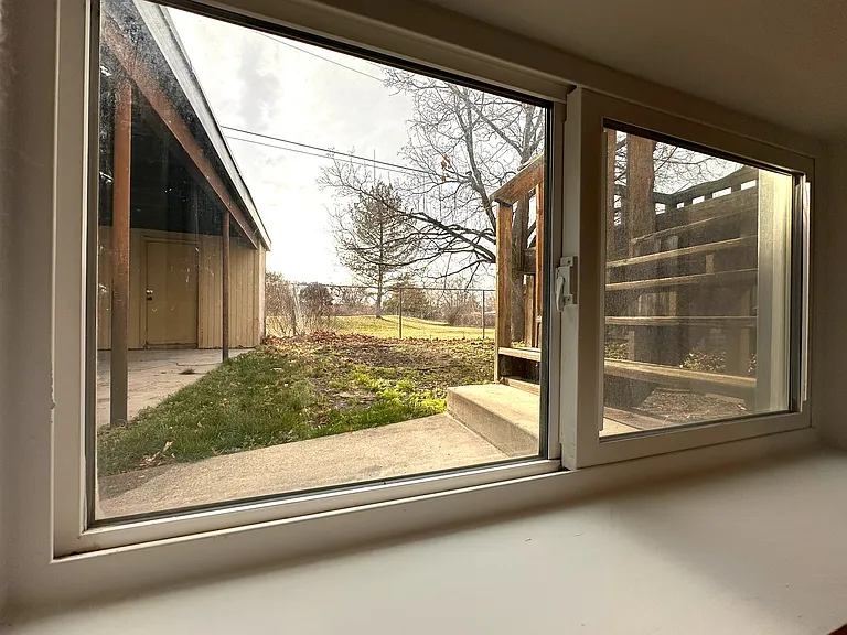 View of Backyard, Carport from Window in Downstairs Bedroom #3