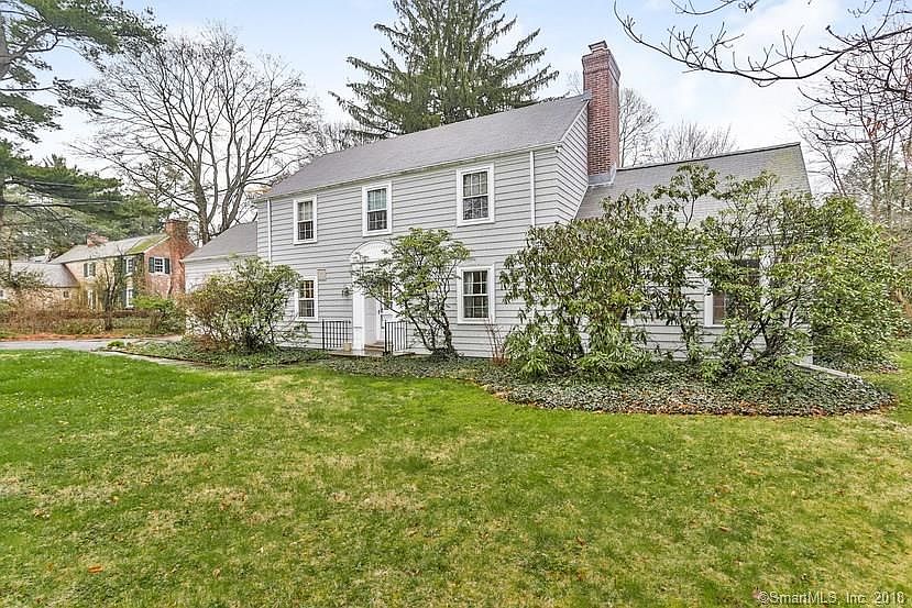 You'll love the spacious comfort of the elegant 5-bedroom Colonial on park-like grounds.