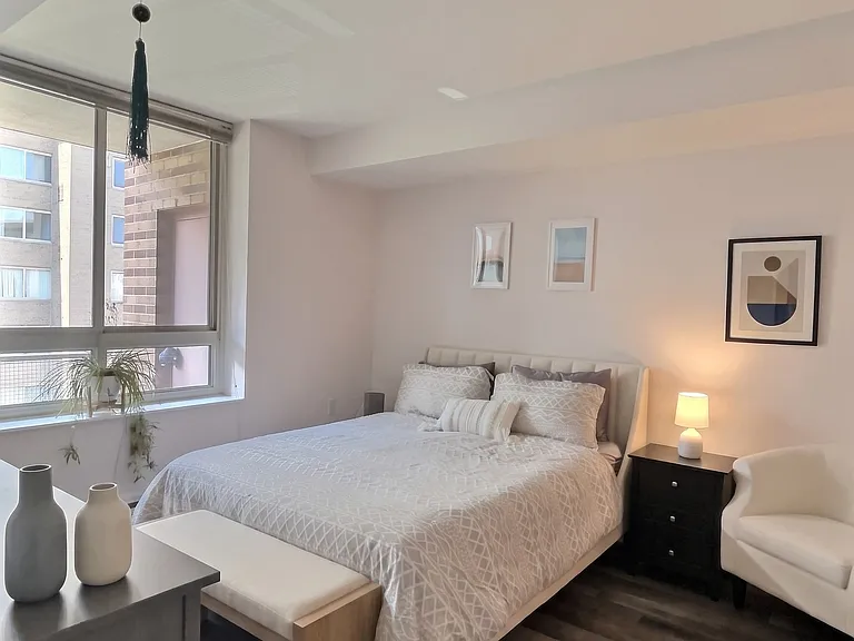 Spacious bedroom with space for dresser, 2 nightstands & king sized bed