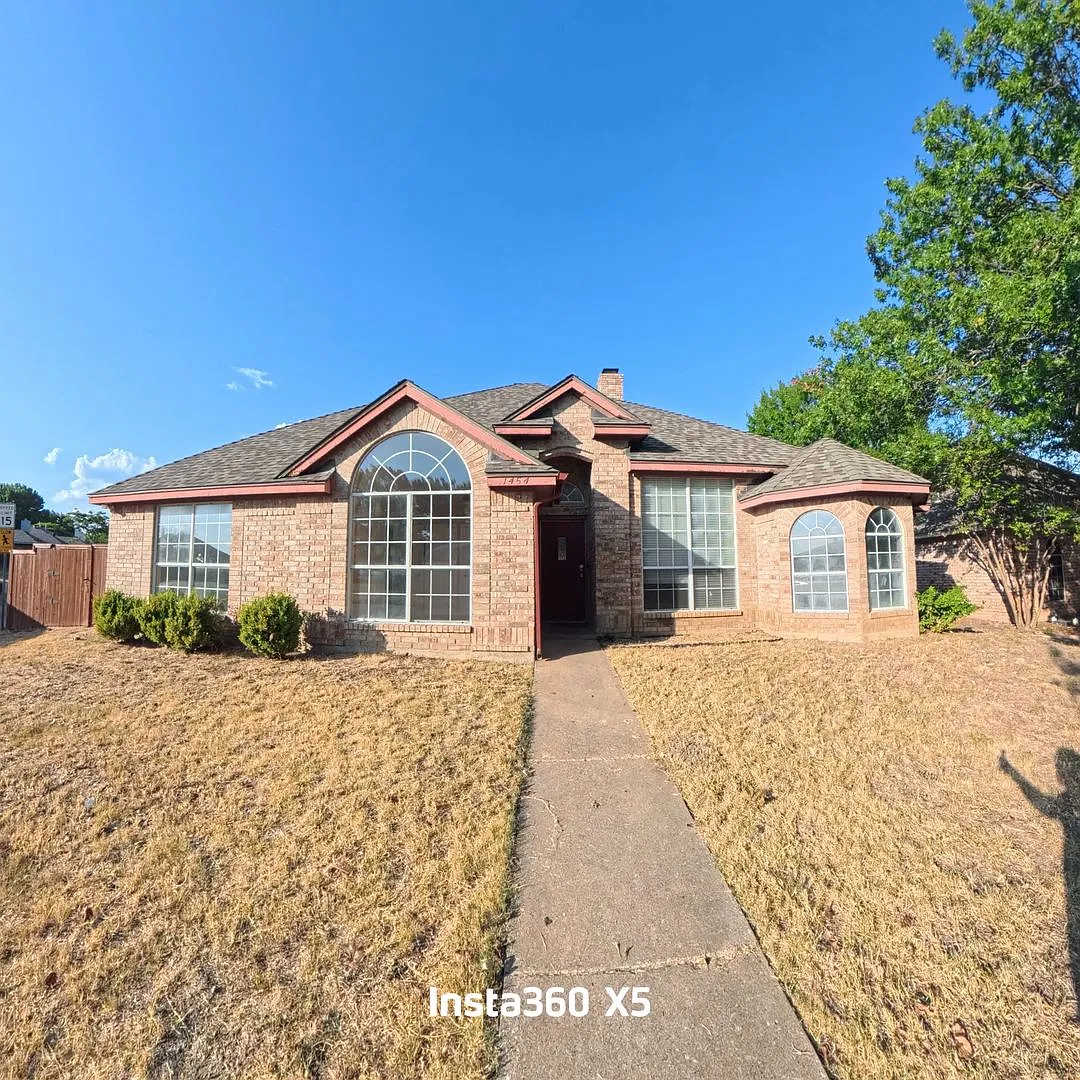 Updated 4-Bedroom Home with See-Through Fireplace & Covered Patio | Lancaster ISD - 1454 Cromwell... — Photo 1