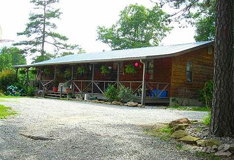 FULL COVERED FRONT PORCH.
