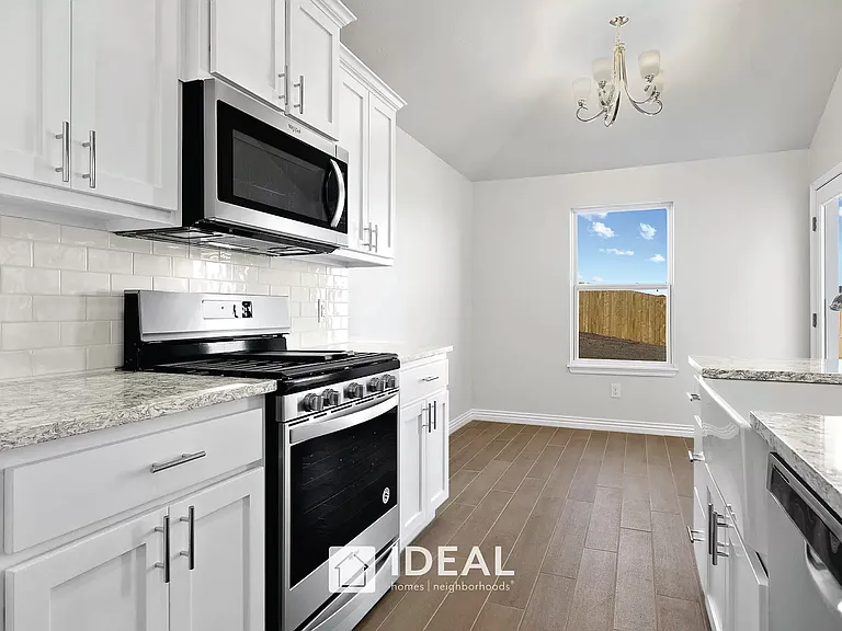 Kitchen - Stainless steel refrigerator is included
