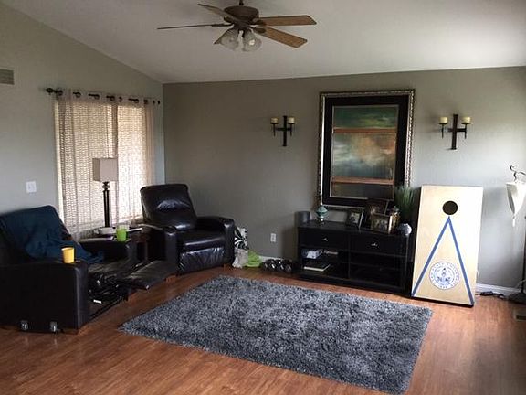 Same living room, different decor.