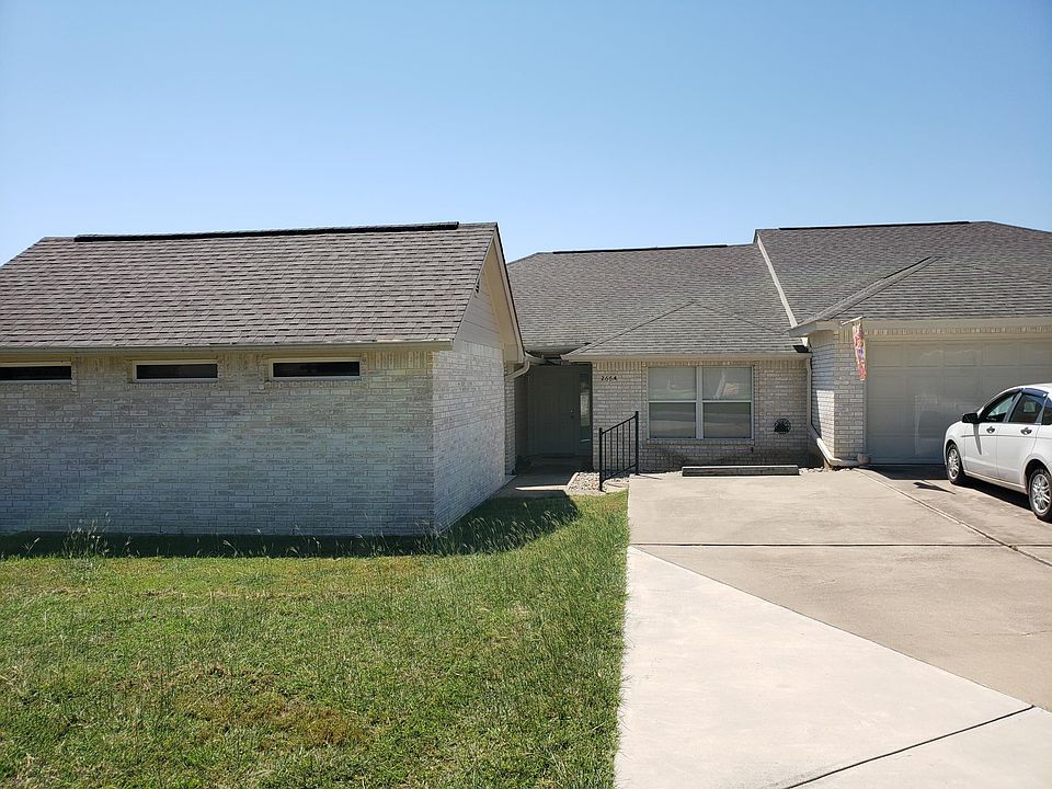 front view. property is left half of duplex.