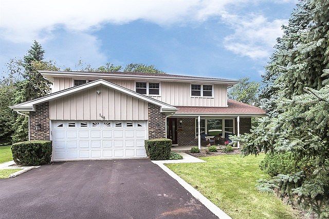 Side Drive fits Two Cars and huge Driveway Can fit 8 more cars.