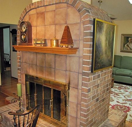 Double Fireplace
						:
						Double sided fireplace divides more formal living area from family room area.