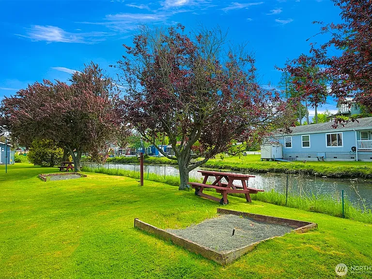 The spacious lawn and Terrell Creek.