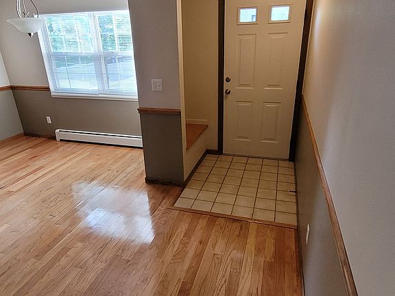 Convenient Entry-Door Bench For Storage & Shoes - 1346 Sunset St. #11 Longmont, CO 80501