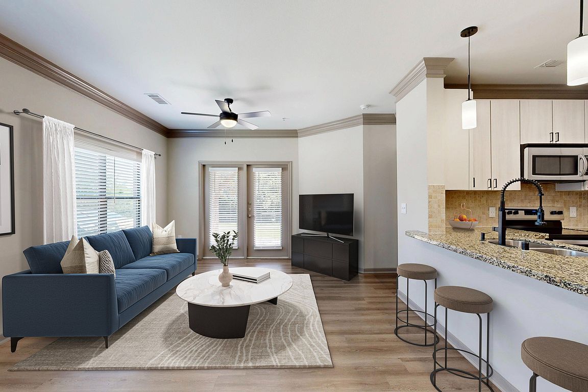 Newly Renovated Living Room with Gorgeous Hardwood-Style Flooring