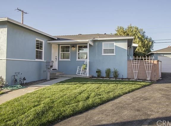 Front Yard with Driveway to Detached Garage