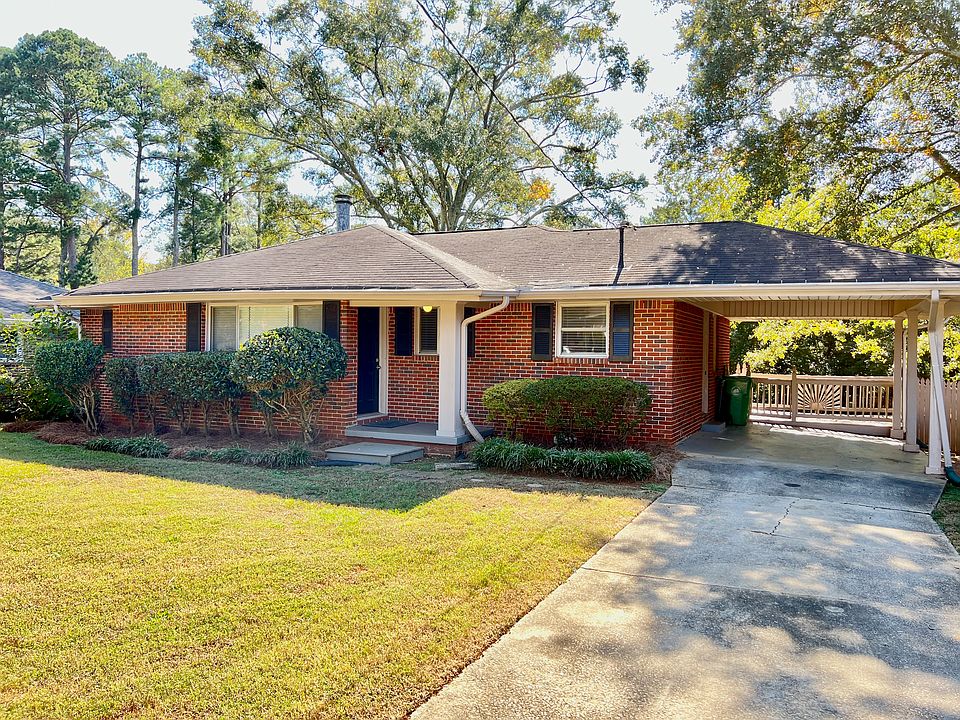 Front of house with Carport