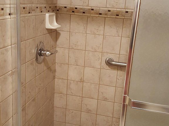 Newly tiled master bathroom shower