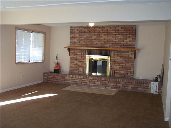 Oversized Living Room with Wood Burning Fireplace