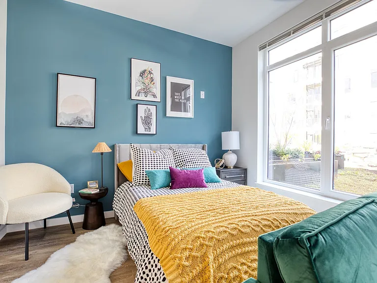 Step into the stylish comfort of Hamilton Crossing Apartments. This inviting bedroom blends modern aesthetics with cozy charm, featuring vibrant decor and ample natural light. Explore your new sanctuary todaya"schedule a tour now!