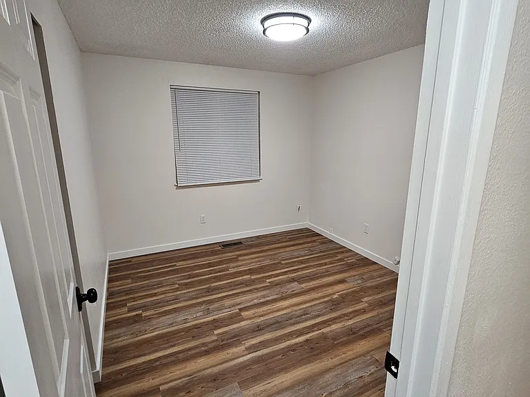 Another view of second bedroom facing front yard.