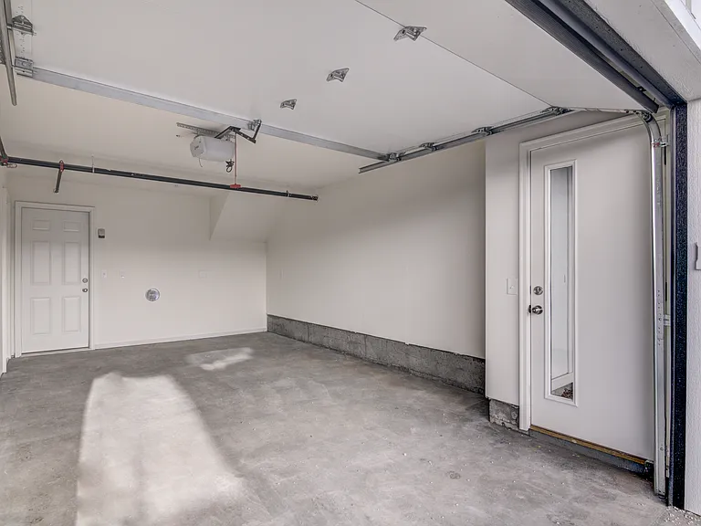 single car garage included with one bedroom units