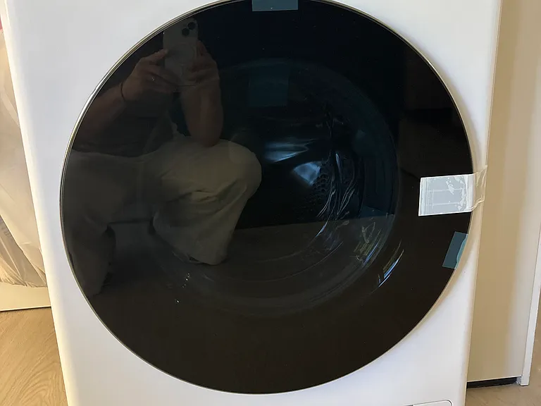 Laundry closet with a combo washer/dryer