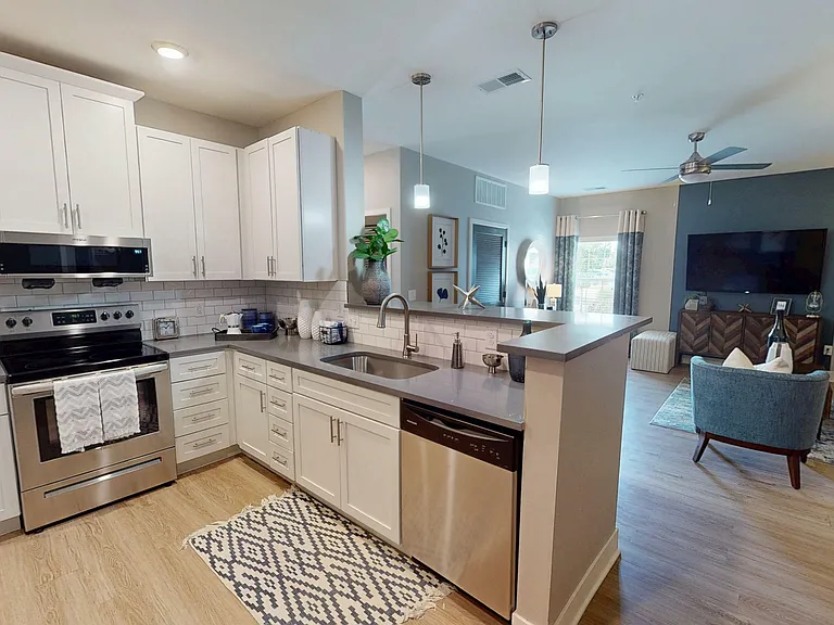 From the kitchen to the hallway, this thoughtfully designed open floor plan gives you room to move, live, and make it your own.