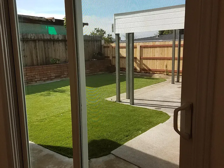 Primary en-suite bedroom backyard view