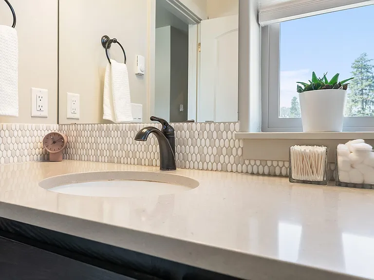 Primary bathroom with shower and separate toilet.