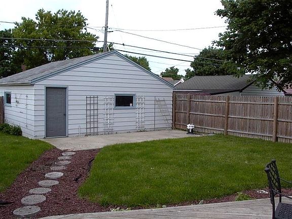 Patio, Deck, Fenced yard and garage