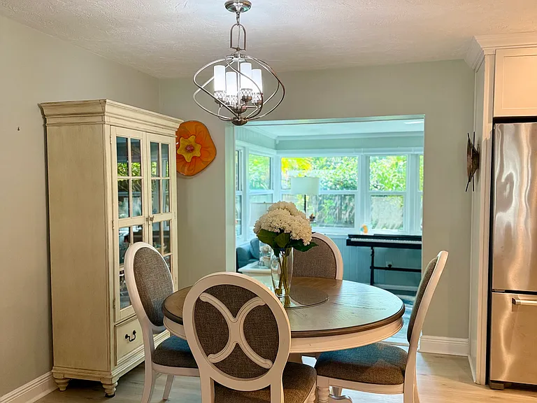 Dining room with view of entry to sun room