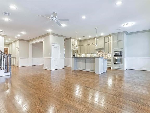 A perspective of the island kitchen from the great room.