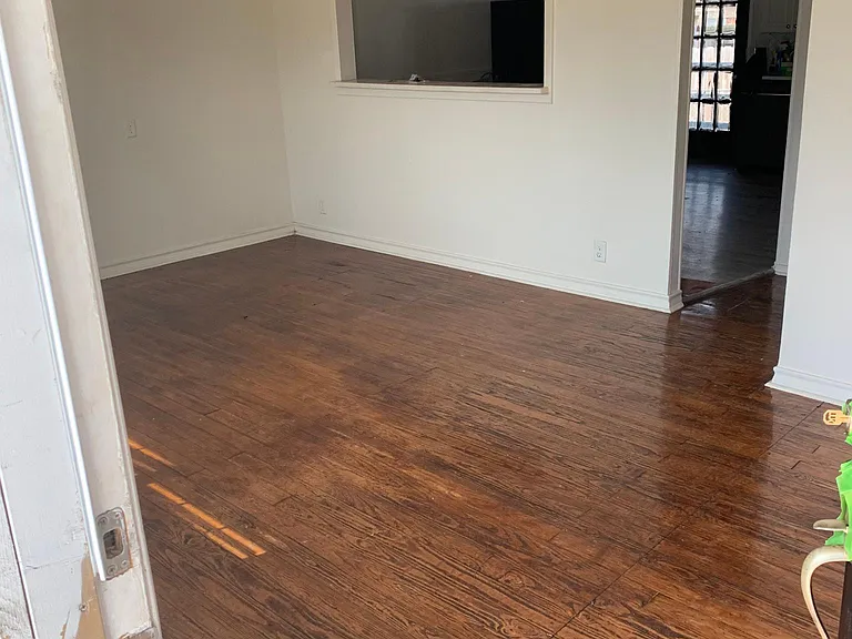 Living room, hallway and bedrooms have hardwood floors.