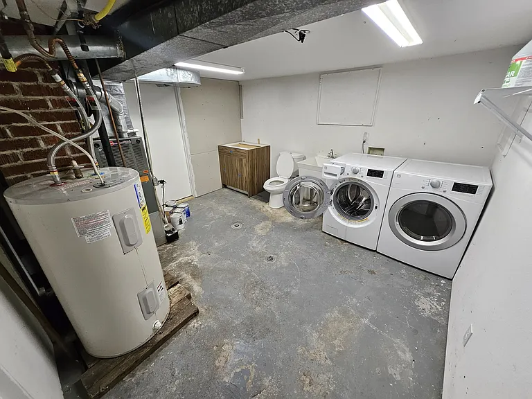 Laundry Room With Half Bath