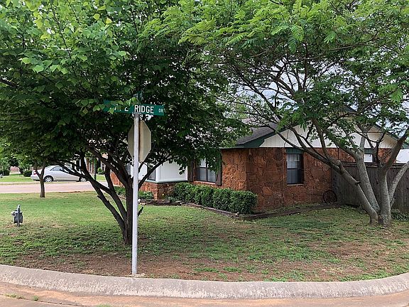 Corner lot with mature trees