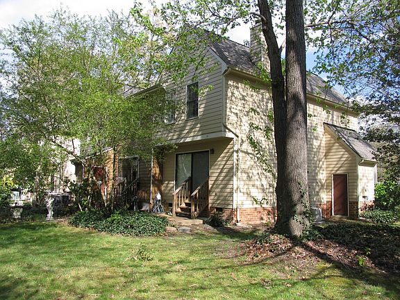 Rear including patio and attached shed