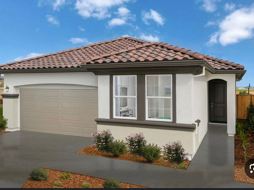 Home exterior. Driveway and covered porch.