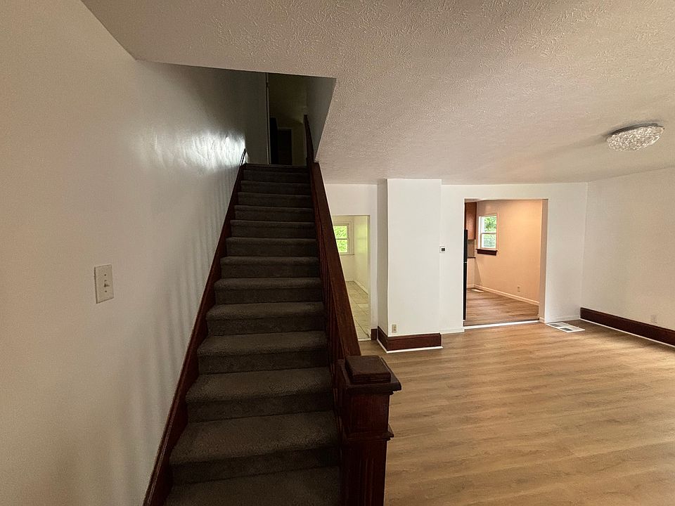 Stairs upstairs and the living room