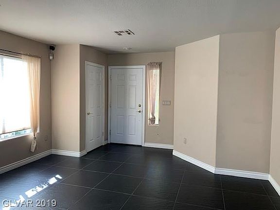4th image of 9724 W Tompkins Ave