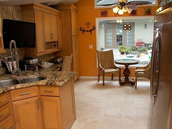 Kitchen looking into the breakfast nook