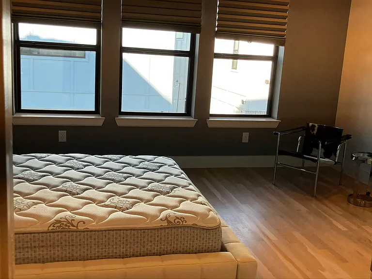 soft blinds complete this primary suite