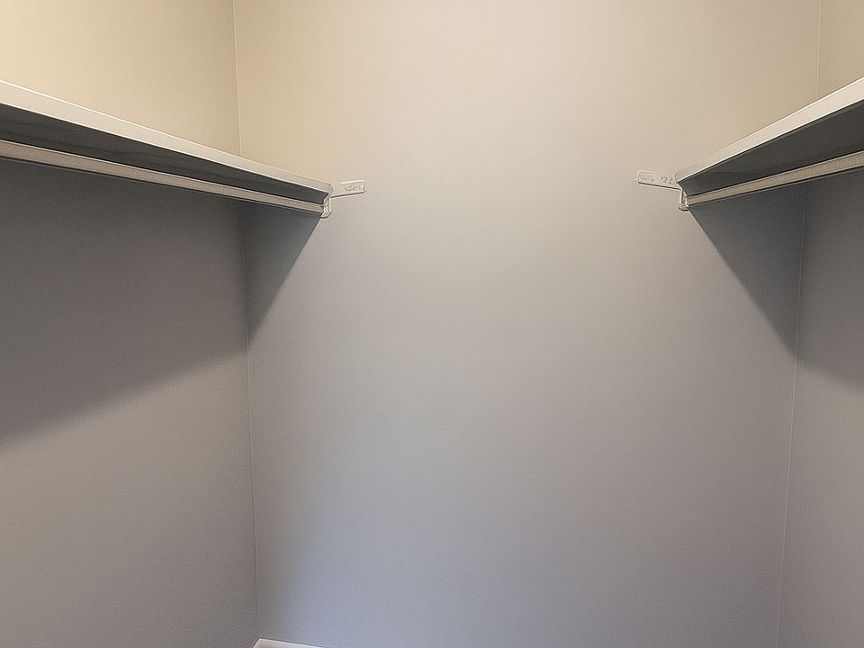 Walk-in closet primary bedroom