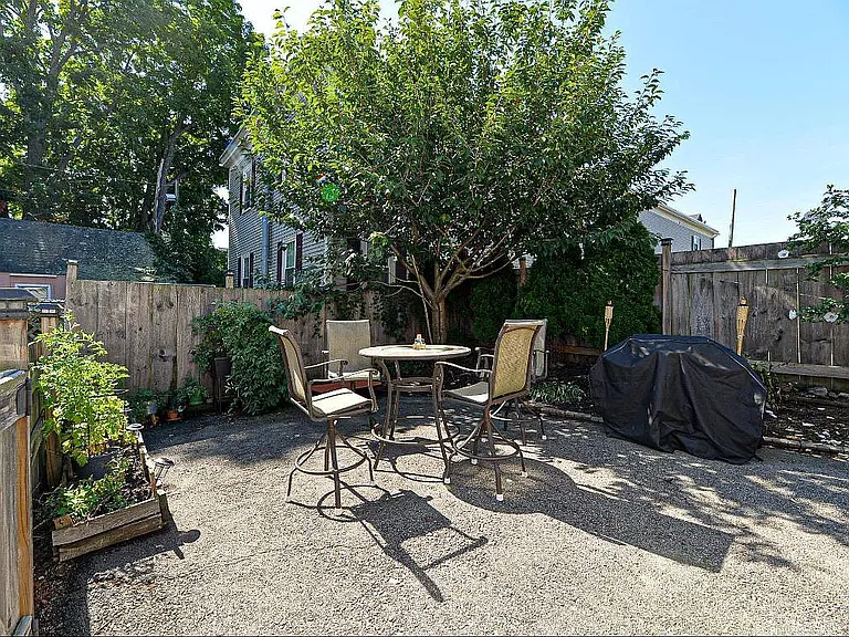 Shared outdoor space with grills _ perfect for summer cookouts.