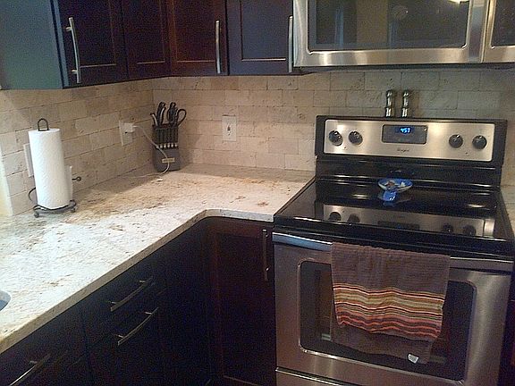 Kitchen w/ Stone Backsplash