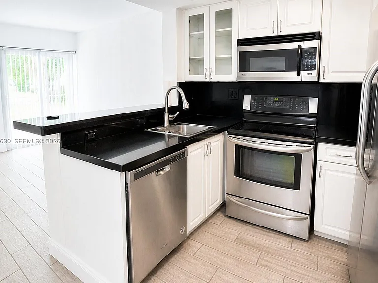 8695 NW 6th Ln #2-212 — Photo 4