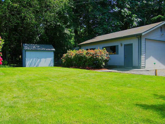 Large 640 sq ft garage/shop w/garden storage shed as well