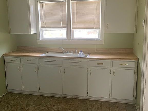 Kitchen sink and cabinets