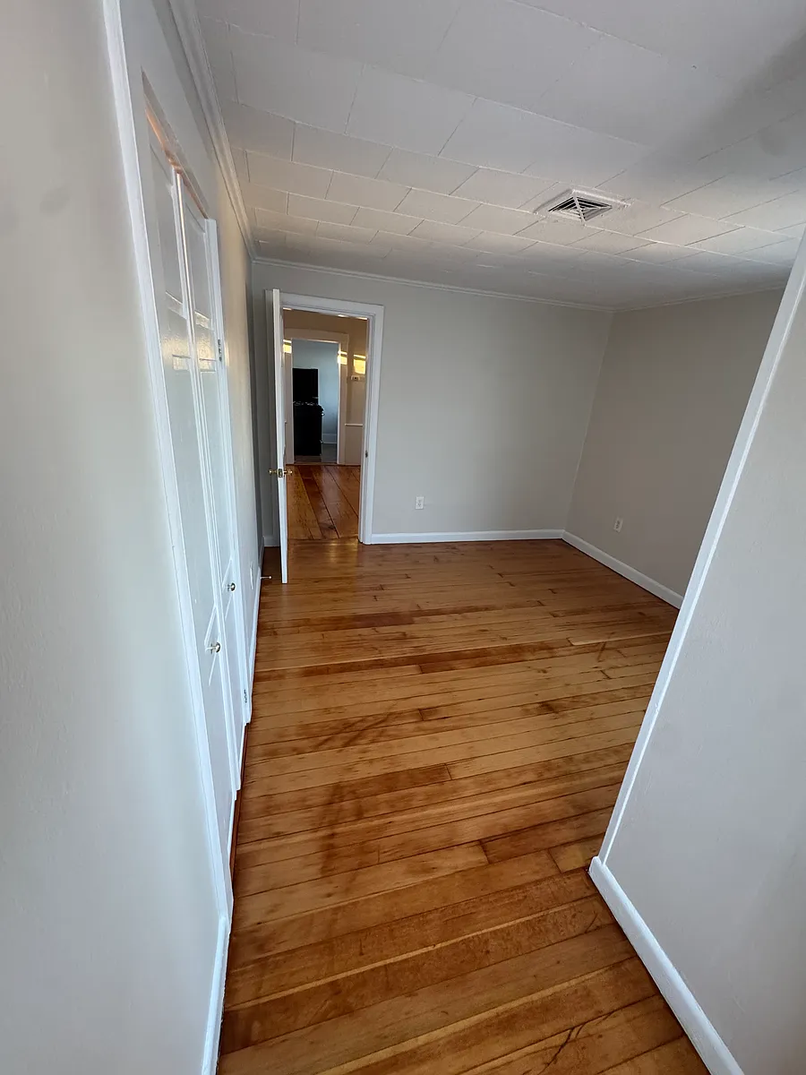 Comfortable bedroom with closet space and deck access! - 264 Washington St #4