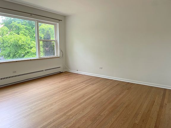 Great natural lighting. Window lighting. Hardwood floors.