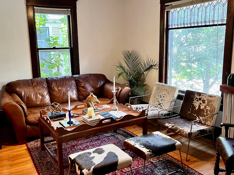 Living room with 60 inch plasma tv mounted on wall (not pictured). Great for movie night.