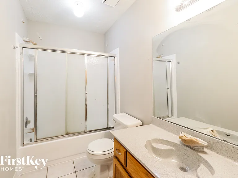 7447 Woodland West Dr — Photo 13