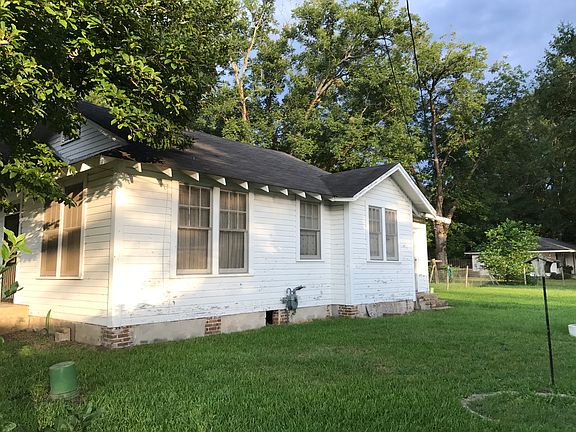Right side of house and yard