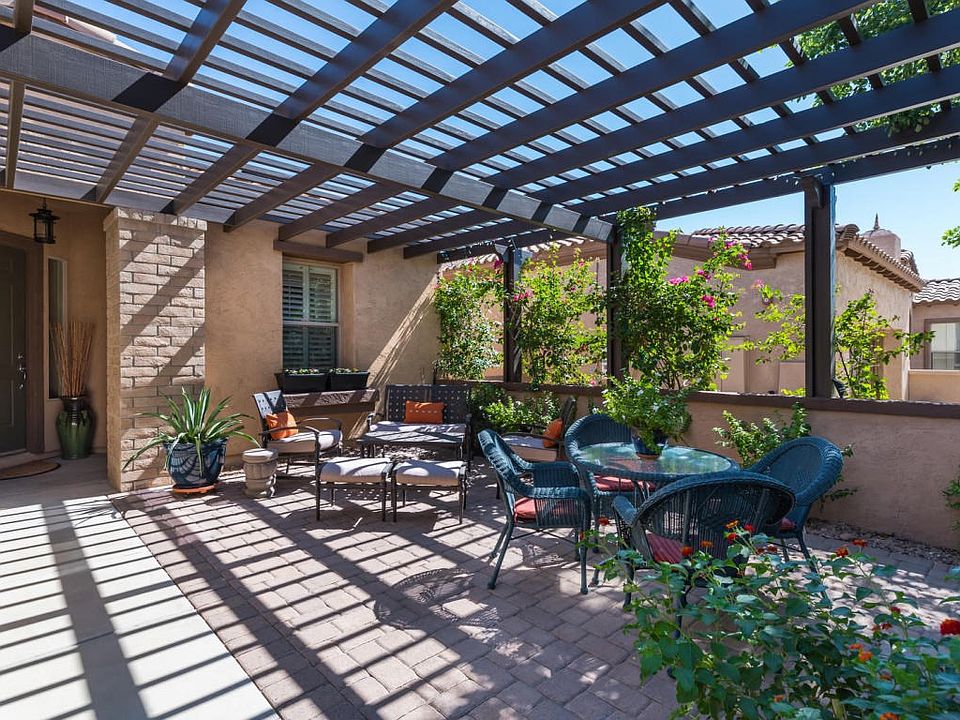 Pavers & Pergola adorn this Courtyard