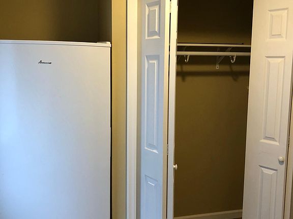 Stand up freezer and closet near side entrance