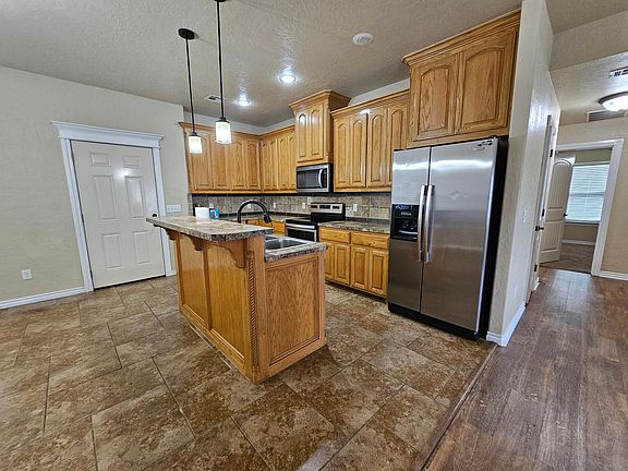 5th image of 2305 SW Rolling Hills Pl